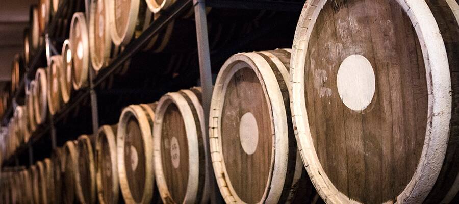 Barrels of plum brandy on Burnie Cruises