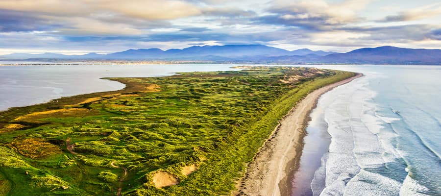 Walk the rugged coastlines of the enchanting Dingle Peninsula. 