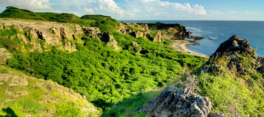 Hike through green spaces and lush beaches in Burgos. 