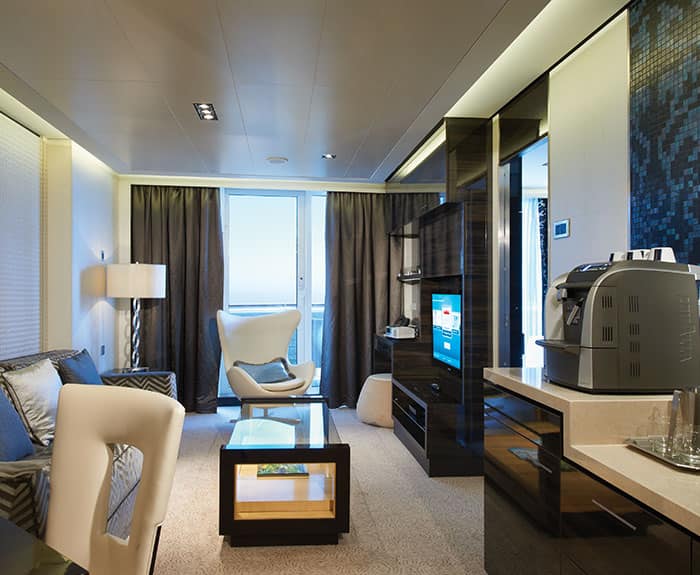 The Haven's Owners Suite with Large Balcony Living Room on Norwegian Breakaway