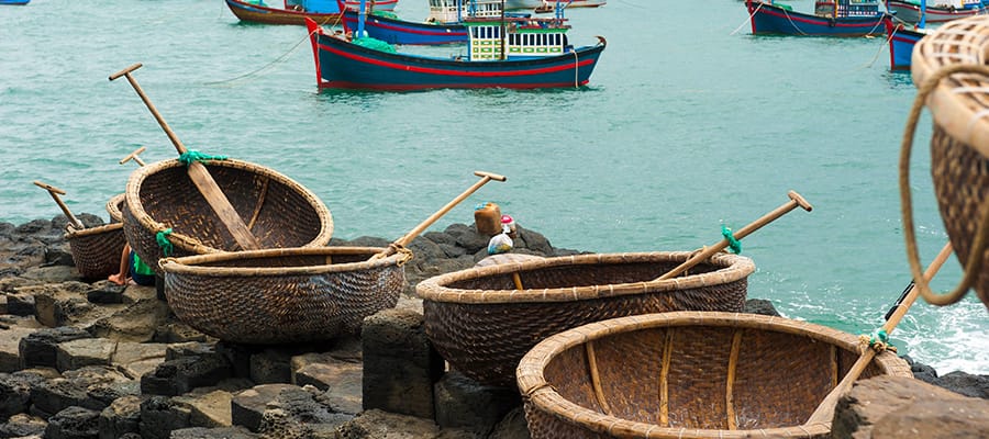 Coracles in polygonal basalt rocks  on Cruises to Nha Trang